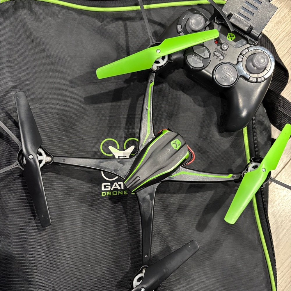 Green and Black Drone with Controller